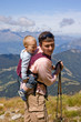 Father and son on the top of mountain