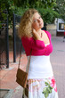 Beautiful young woman walking on the street