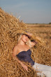 Photo: The beautiful girl in the field with wheat The beautiful girl in the field with wheat
