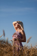 Photo: The beautiful girl in the field with wheat The beautiful girl in the field with wheat