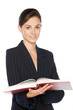 Young female standing with the opened book