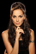 Closeup portrait of fashion model on black background