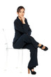 Young business woman sitting on the transparent chair