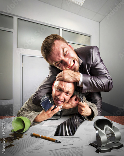 Photo: Businessmen fighting for agreement signing Businessmen fighting for agreement signing