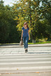 Photo: girl with a bag goes the way of pedestrian zebra girl with a bag goes the way of pedestrian zebra