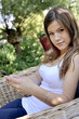Photo: teenage girl with mobile cell phone outdoor teenage girl with mobile cell phone outdoor
