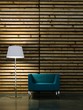 Wohndesign - blauer Sessel vor Holzwand