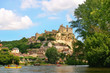 Tourists kayaking on river Dordogne in the south of France.