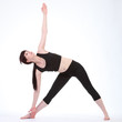 Photo: Revolved Triangle yoga pose Parivrtta Trikonasana Revolved Triangle yoga pose Parivrtta Trikonasana