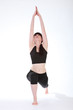 Photo: Fitness girl Yoga Warrior One pose Virabhadrasana Fitness girl Yoga Warrior One pose Virabhadrasana