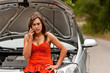 Photo: Broken Car - Young Woman Calls for Assistance Broken Car - Young Woman Calls for Assistance