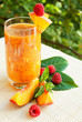 Peach cocktail with raspberries