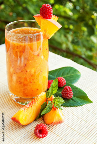 Photo: Peach cocktail with raspberries Peach cocktail with raspberries