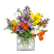 Colorful flower arrangement centerpiece in square glass vase Colorful flower arrangement centerpiece in square glass vase