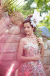 Princess in an vintage dress in nature