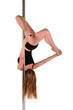 Photo: Young woman exercising pole dance fitness Young woman exercising pole dance fitness