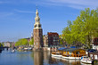Classical Amsterdam view. Boat floats