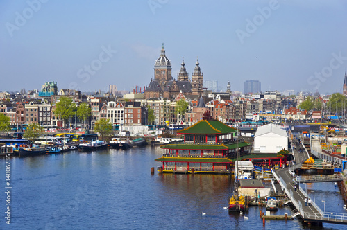 Photo: Classical Amsterdam view. Boat floats Classical Amsterdam view. Boat floats