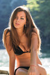 Portrait of beautiful young woman with fine figure