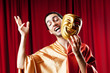 Actor with maks in a funny theater concept