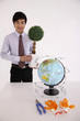 Man holding potted plant smiling
