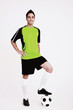 Man stepping on football