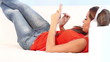 Cute girl lying on sofa listen to the music with headphones