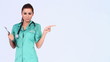 Video: Sexy female doctor pointing at copy space Sexy female doctor pointing at copy space