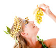 Greek goddess eating grapes
