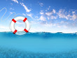 Rescue ring floating on blue waves