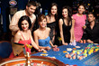 happy people excited about roulette bet outcome