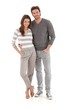Casual young couple embracing smiling