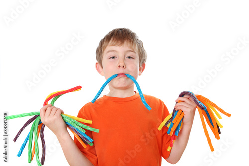 Photo: Boy holding colorful licorice candy Boy holding colorful licorice candy