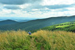 Senior tourist hiking in Bieszczady mountains, Poland Senior tourist hiking in Bieszczady mountains, Poland