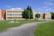 Exterior view of school building with playground.