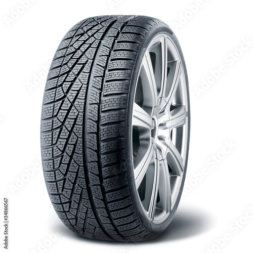 Foto: Winter tire with alurim on white background Winter tire with alurim on white background