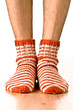 man legs in strip socks man legs in strip socks