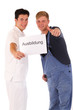 Auszubildende mit Schild