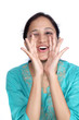 Beautiful young woman screaming
