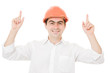 Businessman in helmet pointing up.