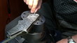 detail of craftman during make incision