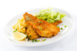 Fish dish - fried fish fillet, French fries with vegetables