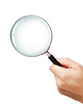Man's hand, holding classic styled magnifying glass
