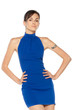 Young fashion model in blue dress posing