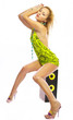 Attractive blonde in a green dress siting on subwoofer.