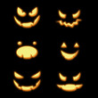 Halloween pumpkin spooky faces in the dark