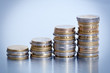 Piles de monnaie en croissance Piles de monnaie en croissance