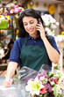 Hispanic woman working in florist