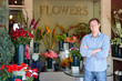 Man standing outside florist
