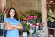 Woman standing outside florist